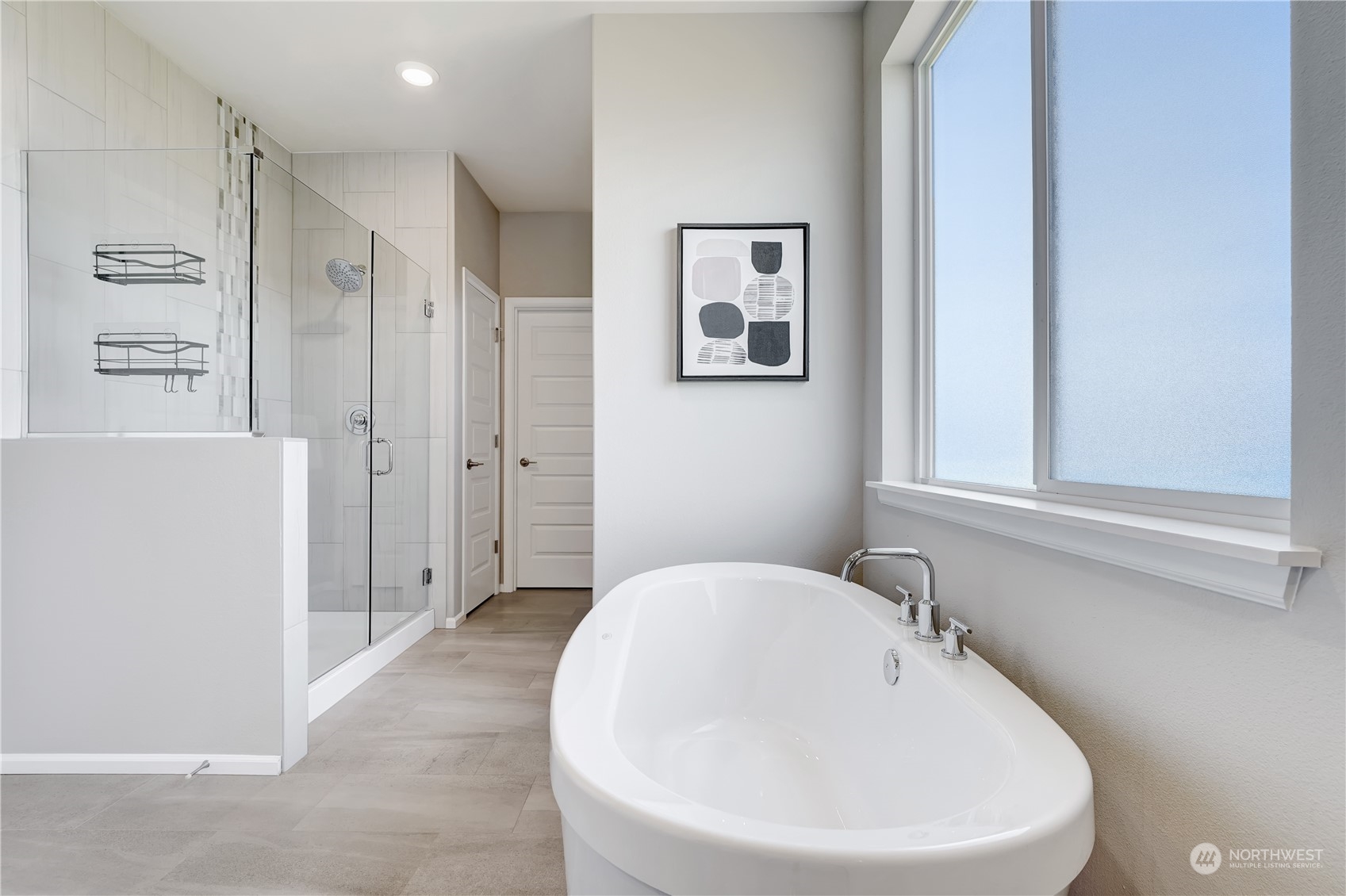 8808 Northeast 201st Place Bothell, WA 98011 - Photo 31 of 38 a bathroom with a bathtub and shower