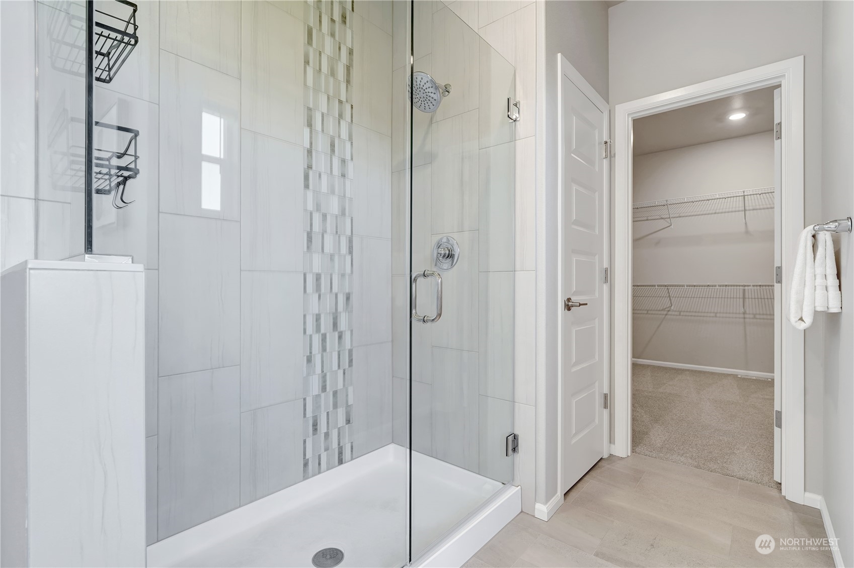 8808 Northeast 201st Place Bothell, WA 98011 - Photo 32 of 38 a bathroom with a shower and a tub