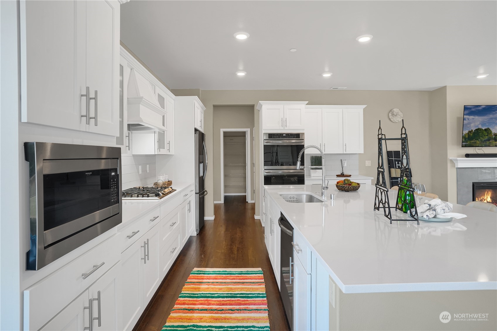 8808 Northeast 201st Place Bothell, WA 98011 - Photo 10 of 38 a kitchen with stainless steel appliances sink microwave and stove