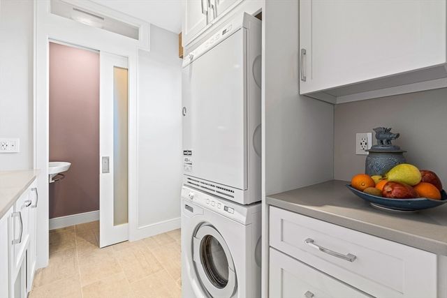 a view of a storage & utility room with closet