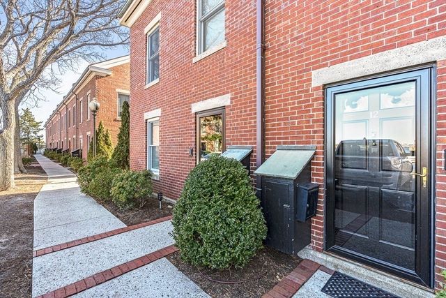 a view of a house with a garden