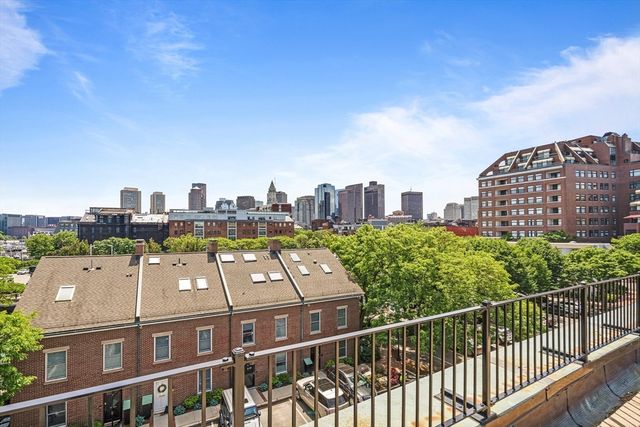 a view of a city with tall buildings