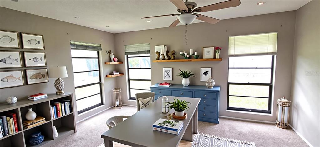 2766 Duffer Road Sebring, FL 33872 - Photo 22 of 63 a living room with furniture and a window