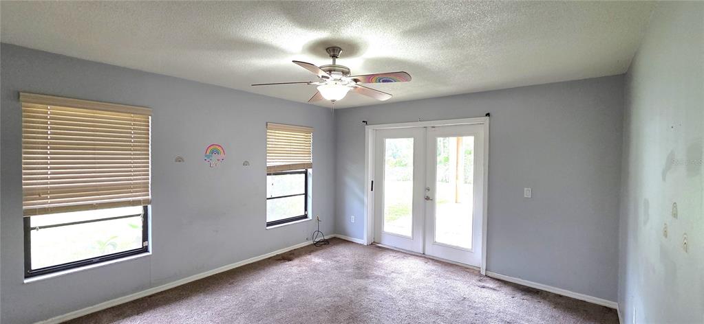 2766 Duffer Road Sebring, FL 33872 - Photo 31 of 63 a view of an empty room with a window