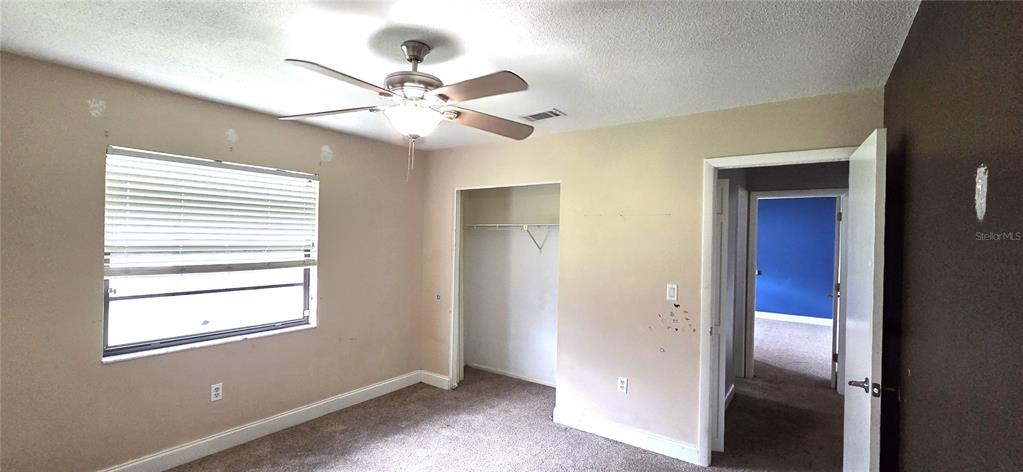 2766 Duffer Road Sebring, FL 33872 - Photo 40 of 63 a view of an empty room with a window