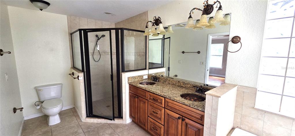 2766 Duffer Road Sebring, FL 33872 - Photo 53 of 63 a view of bathroom with a sink a toilet and shower
