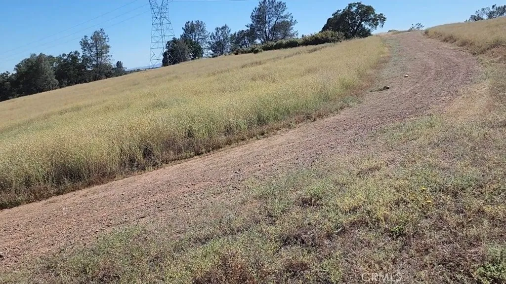 0 Foothill Oroville, CA 95966 - Photo 15 of 53 a view of a dry yard with mountains in the background
