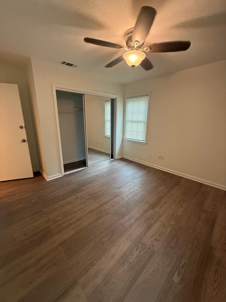 4355 Byron Street Columbus, GA 31907 - Photo 8 of 20 a view of an empty room with wooden floor