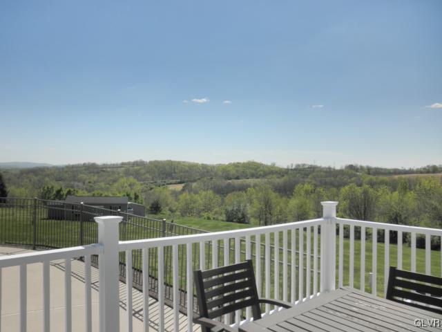 136 South Penn Dixie Road Nazareth, PA 18064 - Photo 4 of 30 a view of a wooden deck and a forest