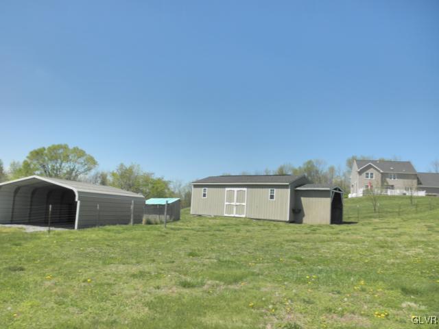136 South Penn Dixie Road Nazareth, PA 18064 - Photo 8 of 30 a front view of a house with a garden
