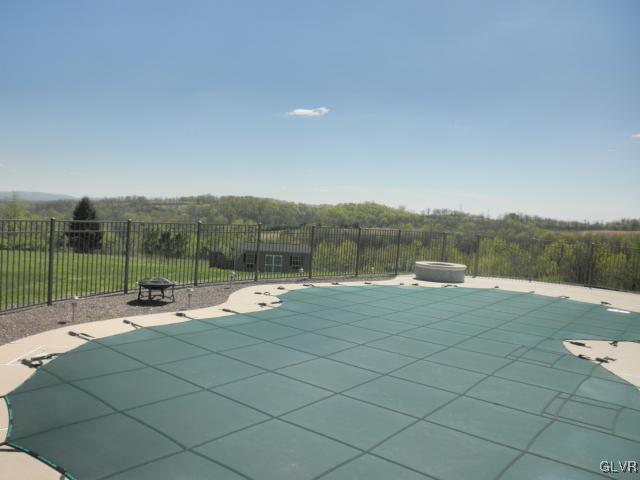 136 South Penn Dixie Road Nazareth, PA 18064 - Photo 10 of 30 a view of a swimming pool and lounge chairs