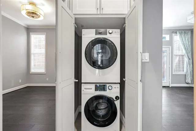 a utility room with dryer and washer