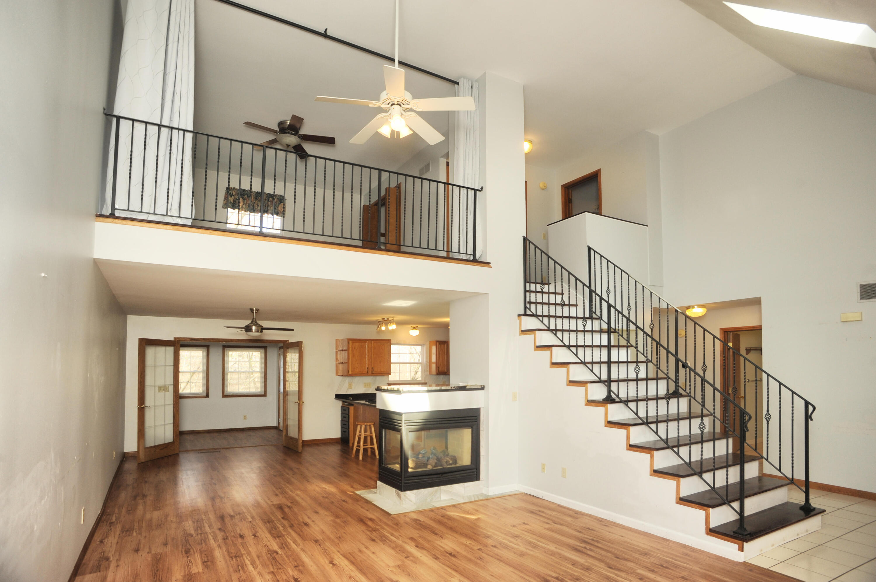 216 Summertree Drive Porter, IN 46304 - Photo 2 of 28 a view of entryway and hall with wooden floor