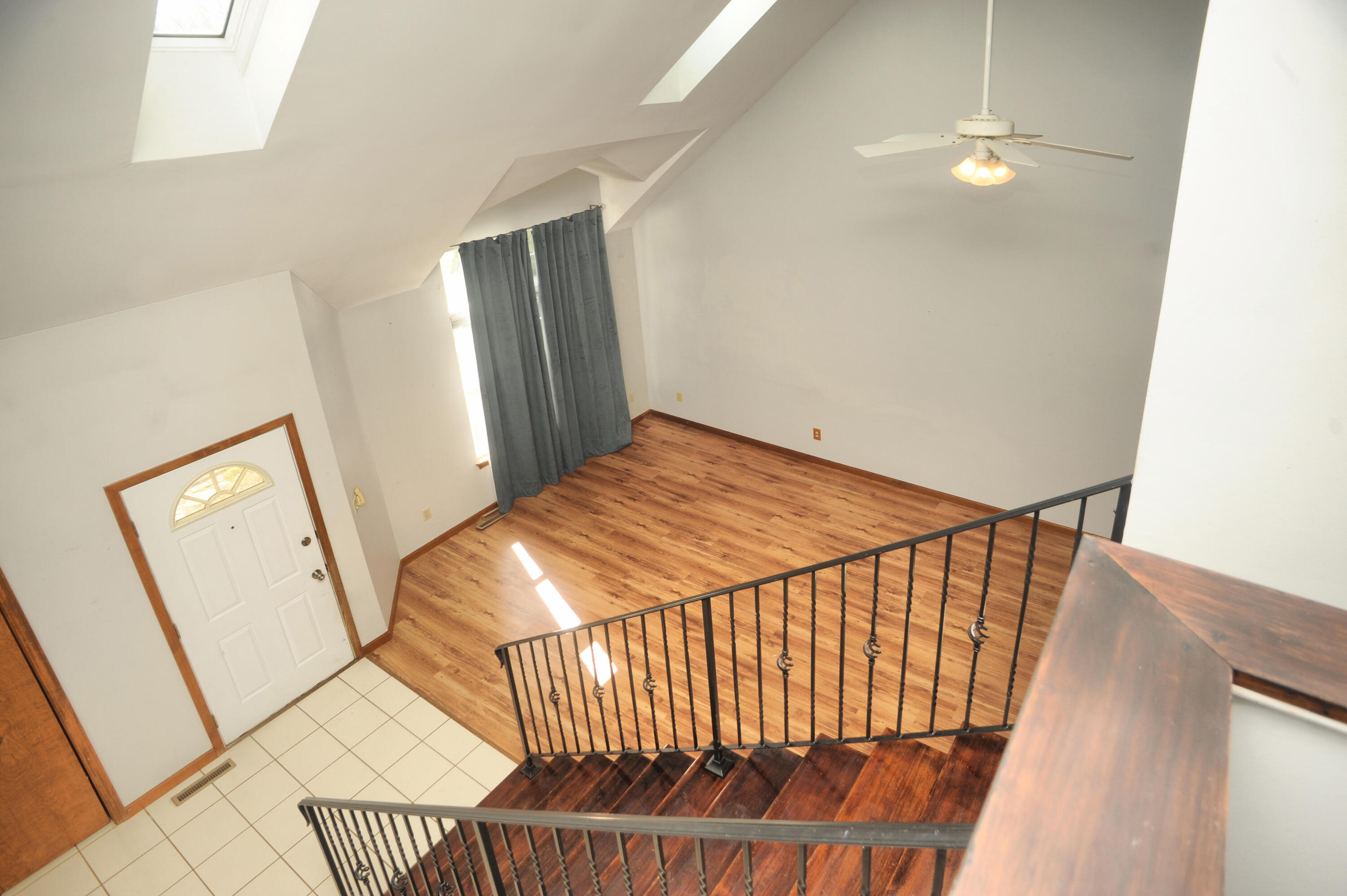 216 Summertree Drive Porter, IN 46304 - Photo 23 of 28 a bedroom with a bed and wooden floor