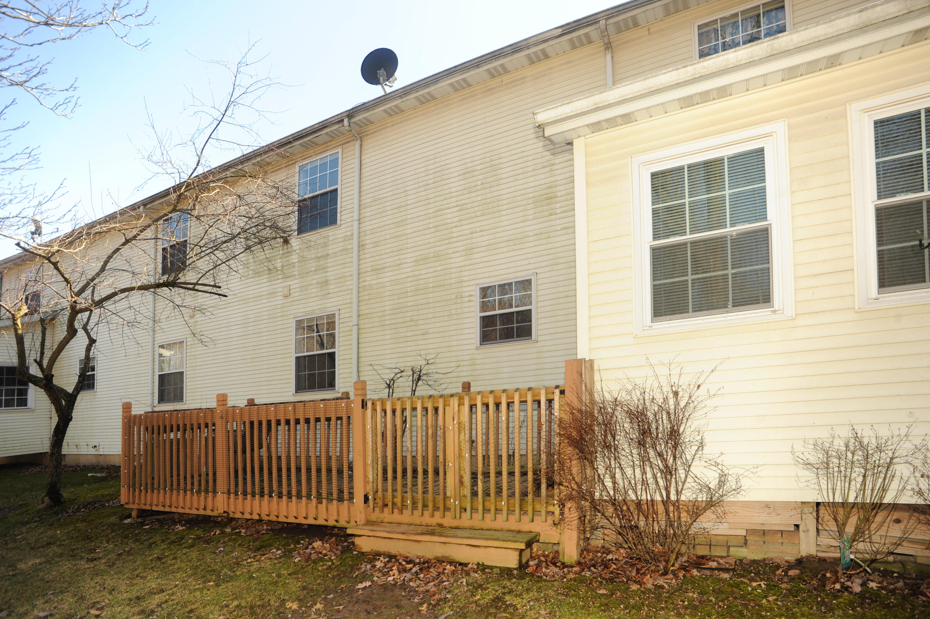 216 Summertree Drive Porter, IN 46304 - Photo 24 of 28 a front view of a house with a fence