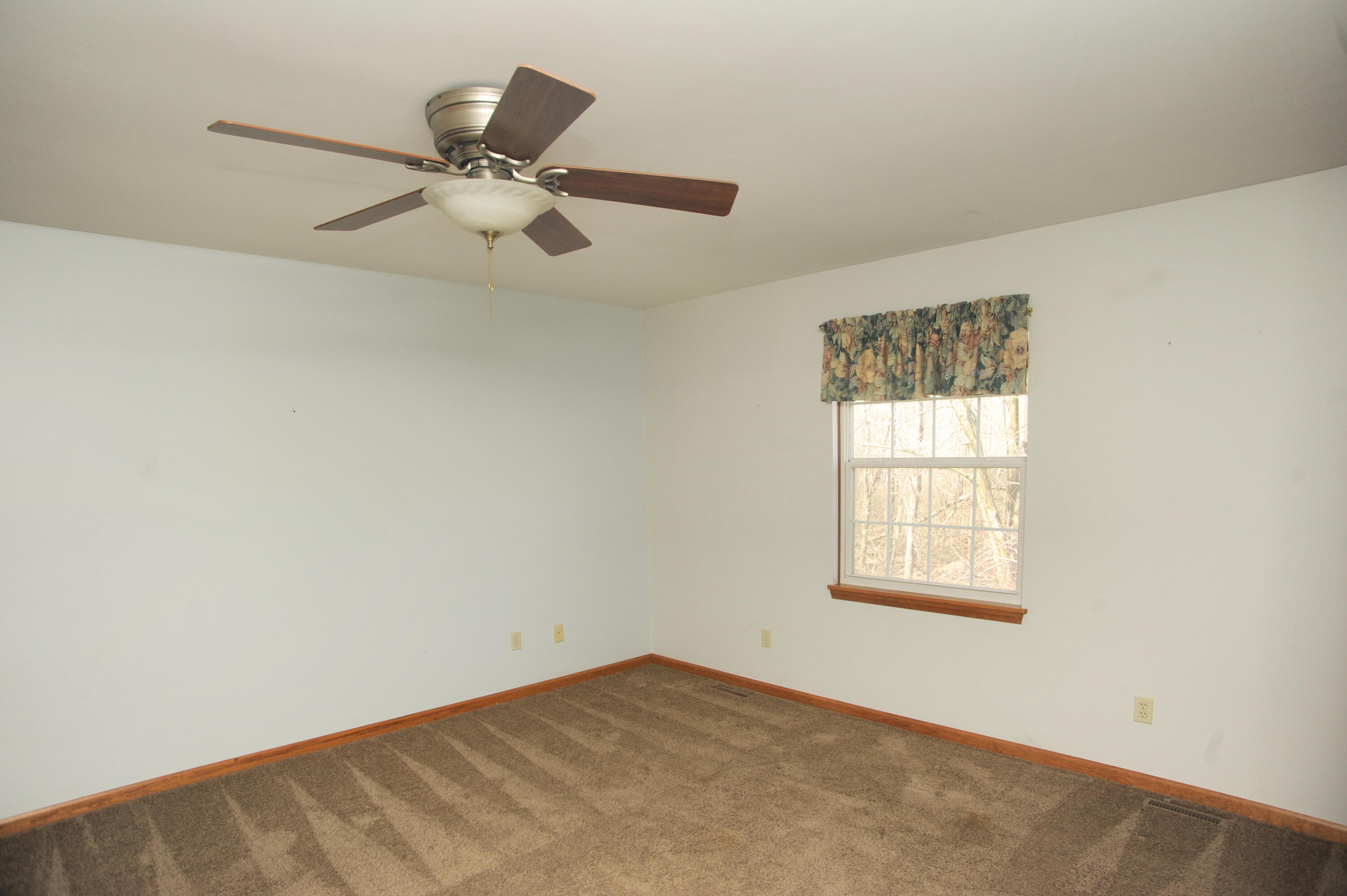 216 Summertree Drive Porter, IN 46304 - Photo 25 of 28 an empty room with a window