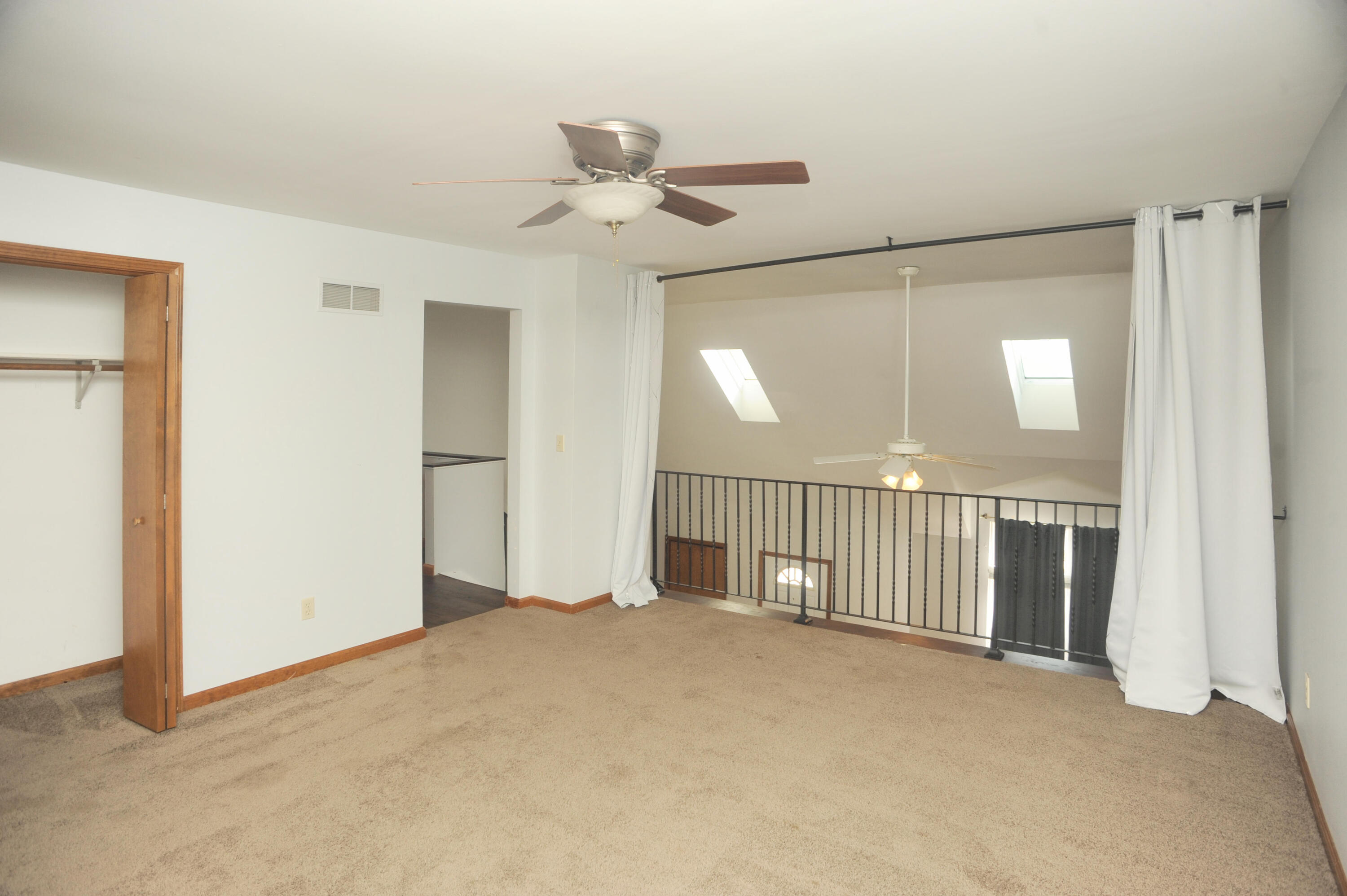 216 Summertree Drive Porter, IN 46304 - Photo 28 of 28 a view of a hallway with a ceiling fan