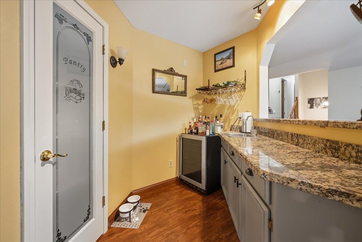 2527 Dynamic Way Rescue, CA 95672 - Photo 11 of 37 a bathroom with a granite countertop sink a mirror and a shower