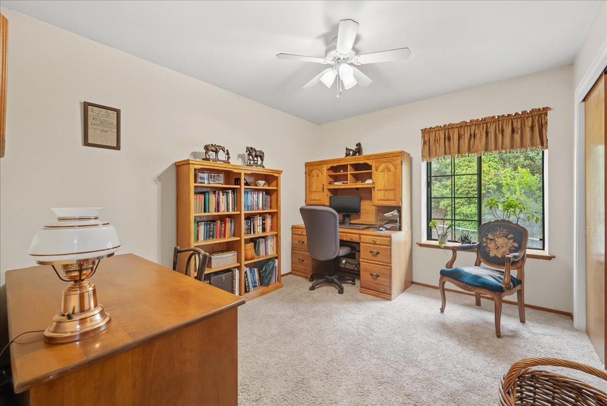 2527 Dynamic Way Rescue, CA 95672 - Photo 13 of 37 a view of a livingroom with workspace and a window