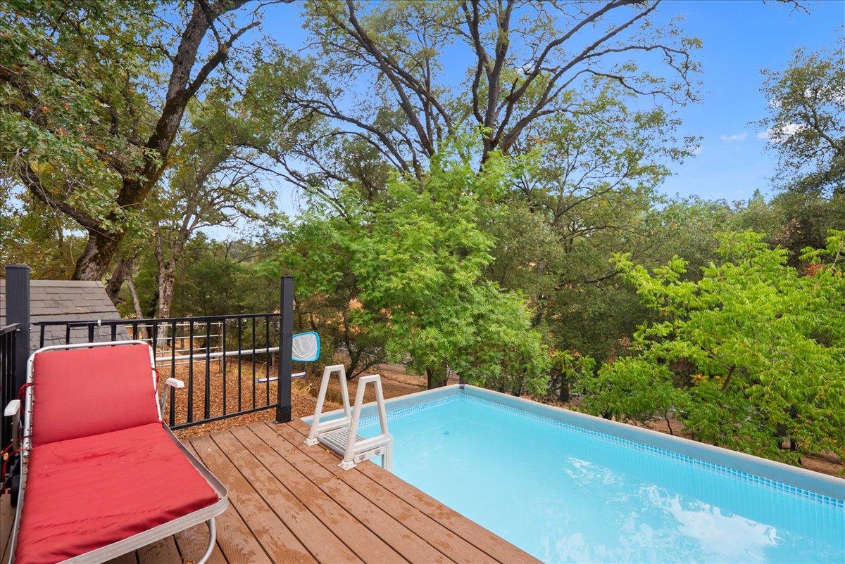 2527 Dynamic Way Rescue, CA 95672 - Photo 27 of 37 a balcony with wooden floor and city view