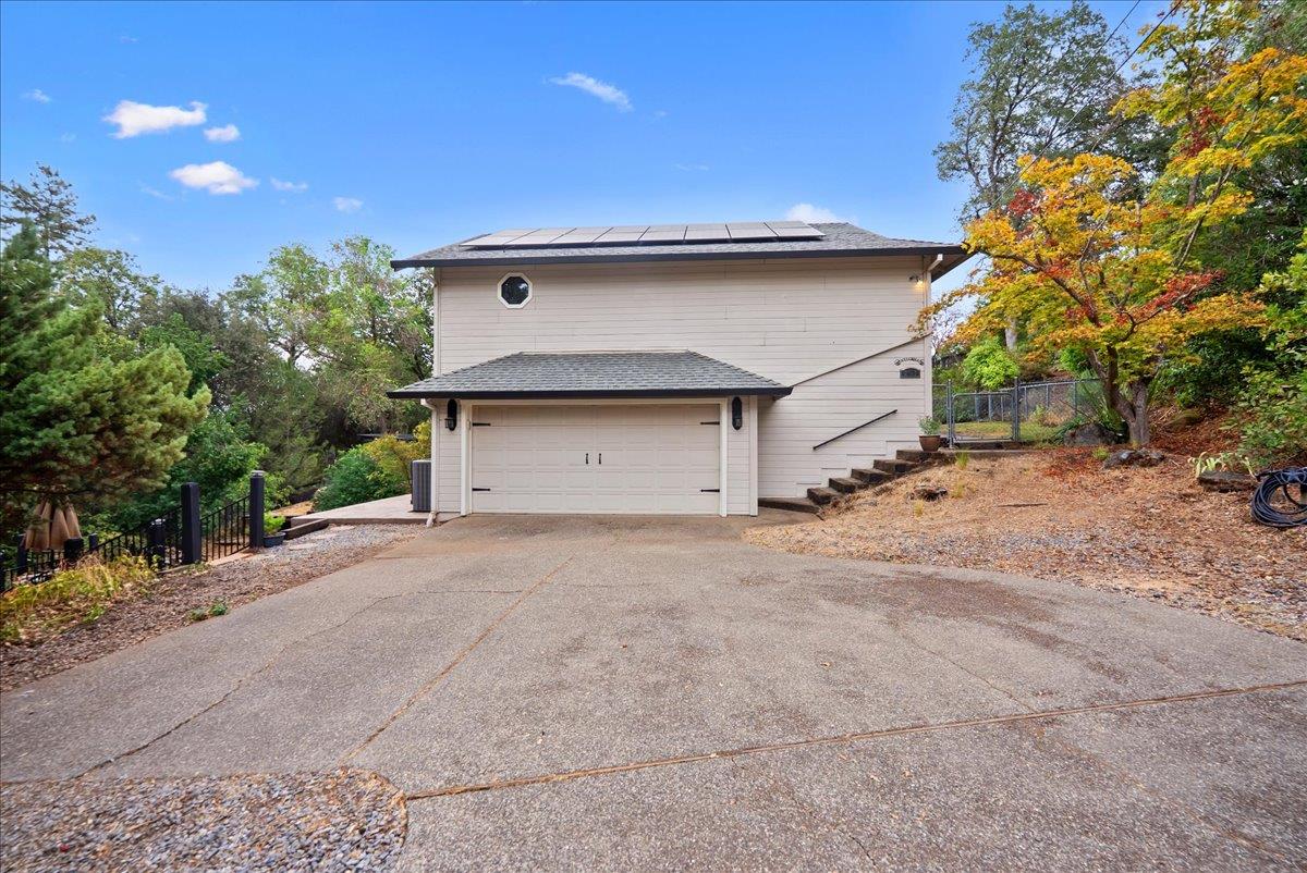 2527 Dynamic Way Rescue, CA 95672 - Photo 33 of 37 a front view of a house with a yard and garage