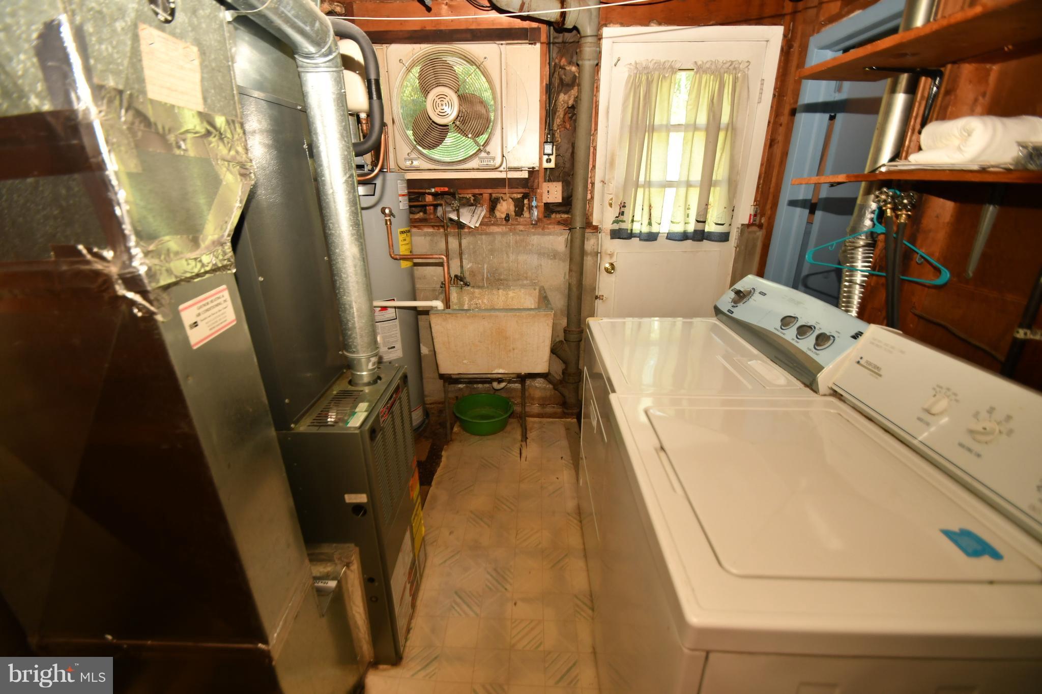 9222 Orbitan Road Baltimore, MD 21234 - Photo 19 of 27 Laundry and exit to backyard