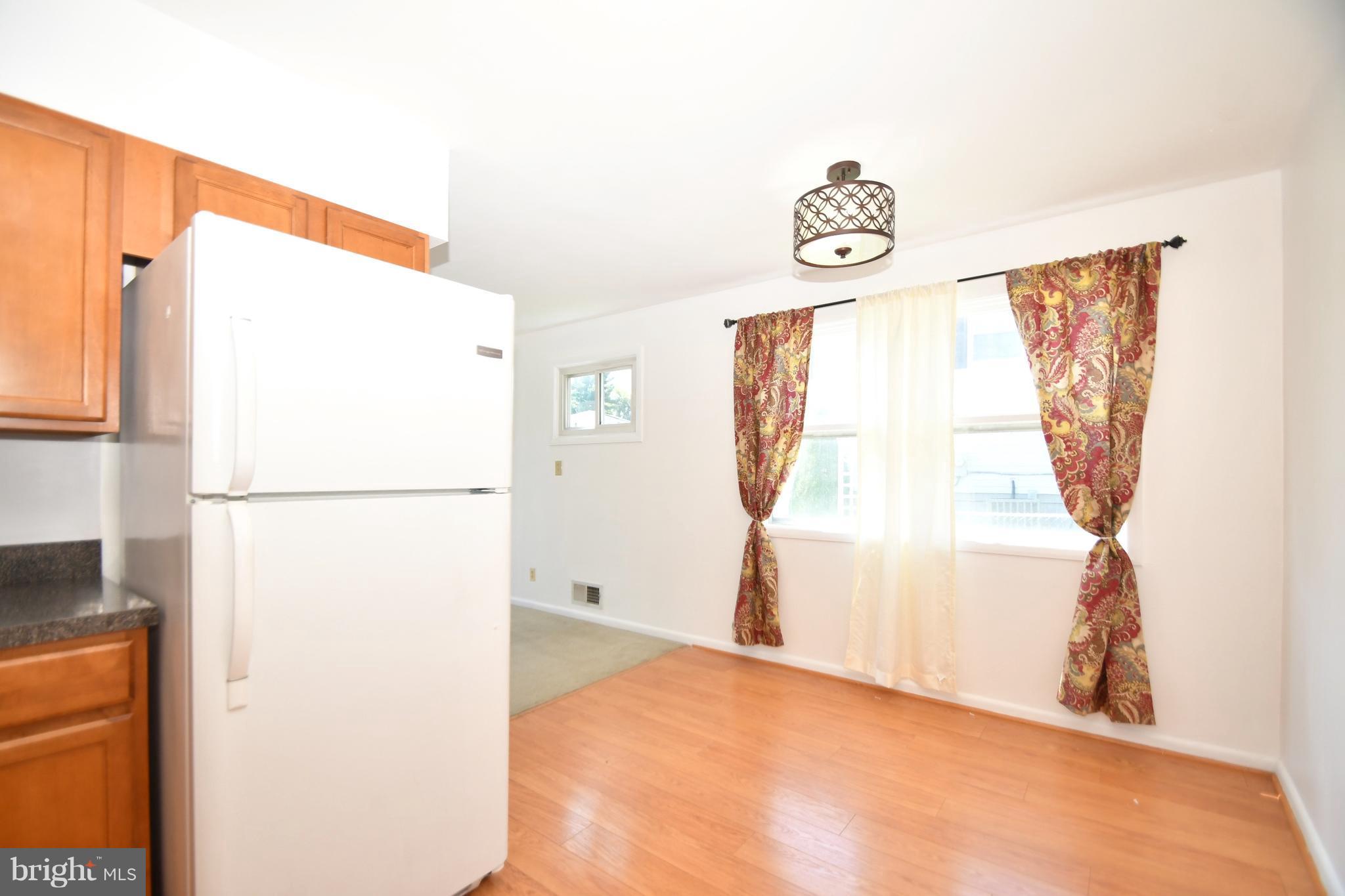 9222 Orbitan Road Baltimore, MD 21234 - Photo 8 of 27 With table space