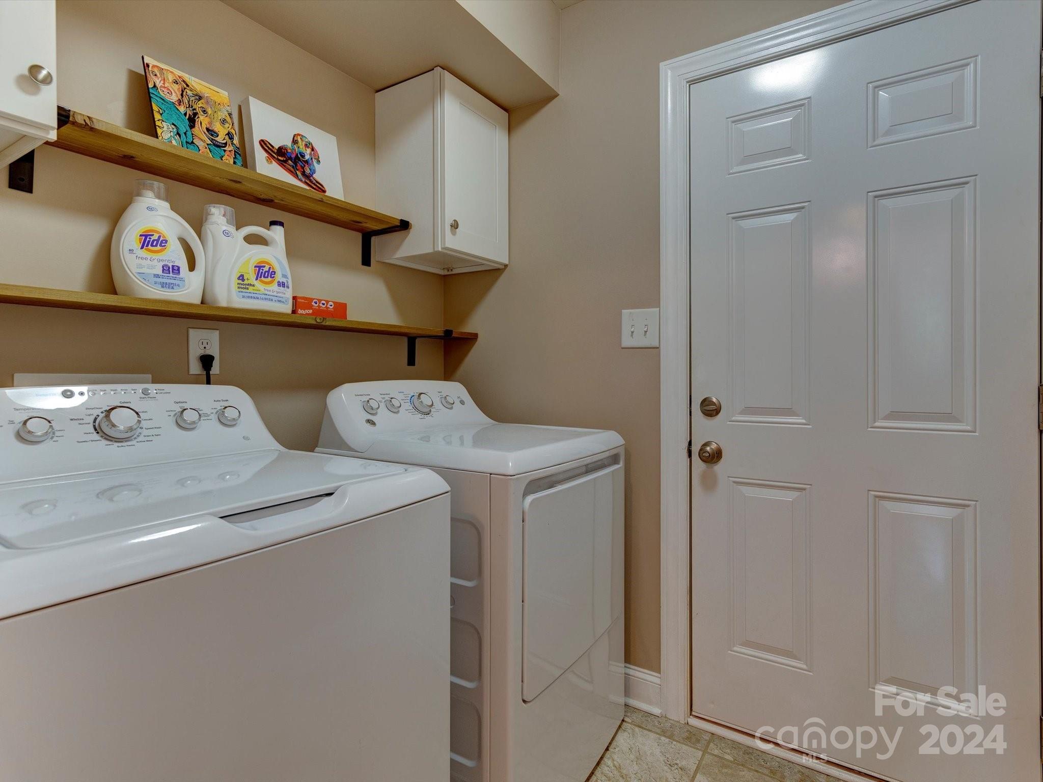 4403 Zee Court Monroe, NC 28110 - Photo 15 of 35 a utility room with dryer and washer