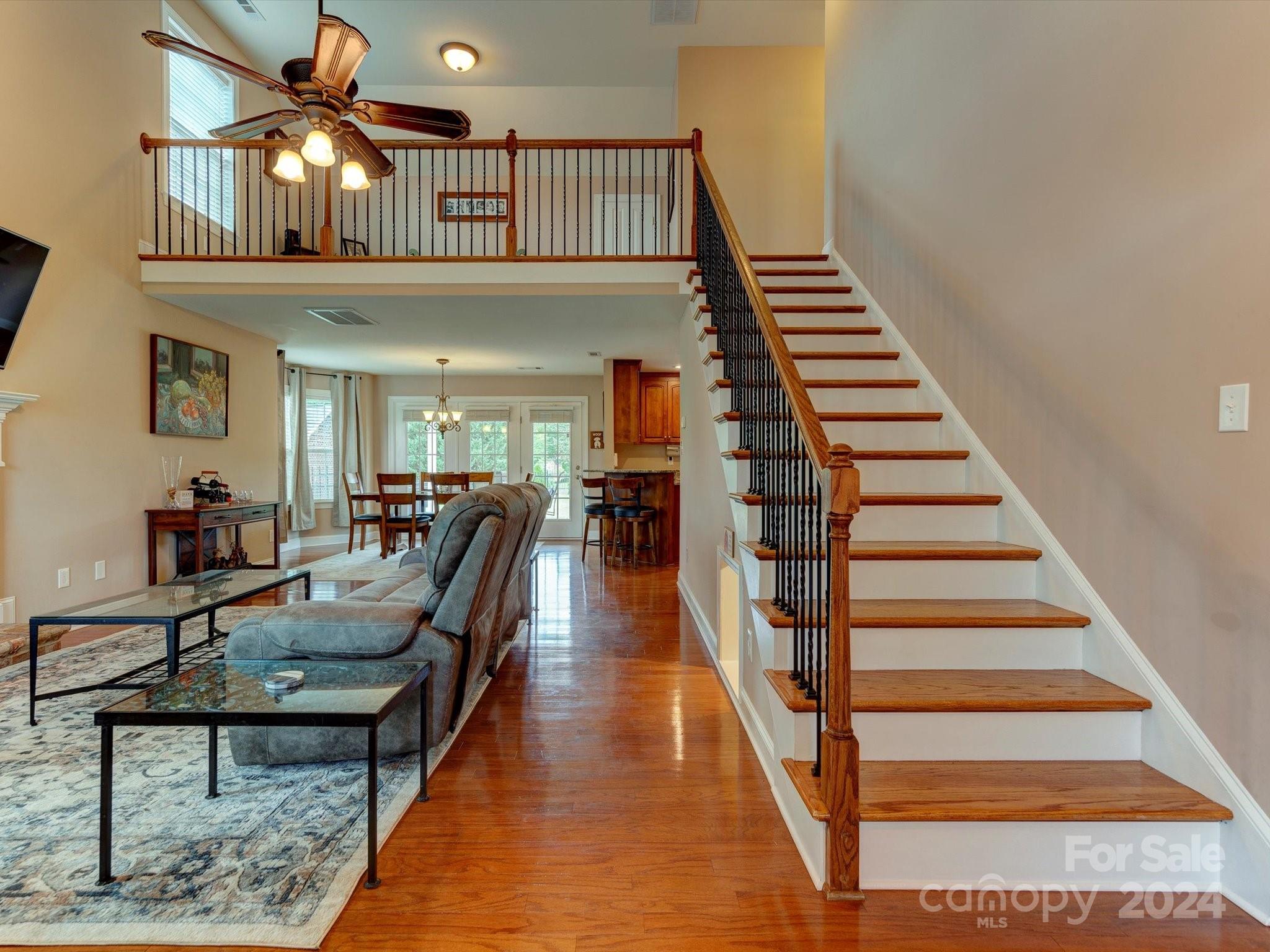 4403 Zee Court Monroe, NC 28110 - Photo 17 of 35 a view of entryway and hall with wooden floor