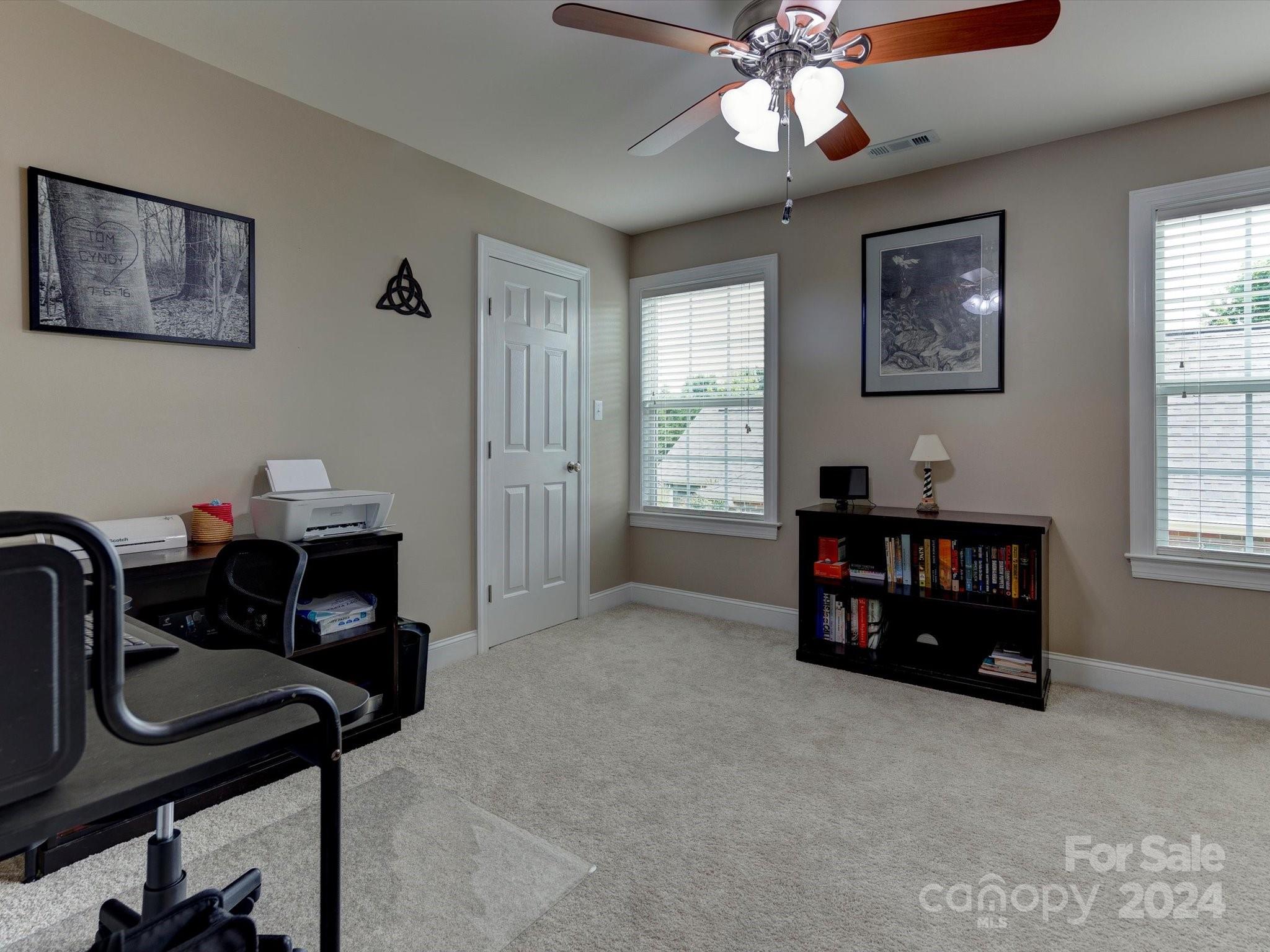 4403 Zee Court Monroe, NC 28110 - Photo 20 of 35 a bedroom with furniture and a window