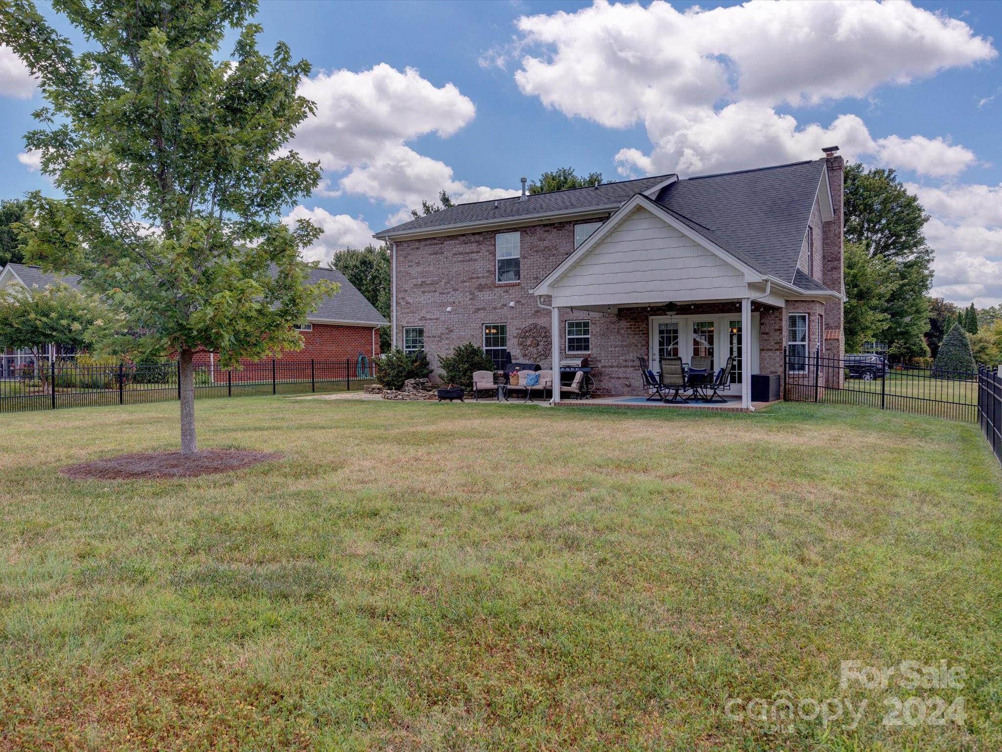 4403 Zee Court Monroe, NC 28110 - Photo 30 of 35 a front view of a house with a yard