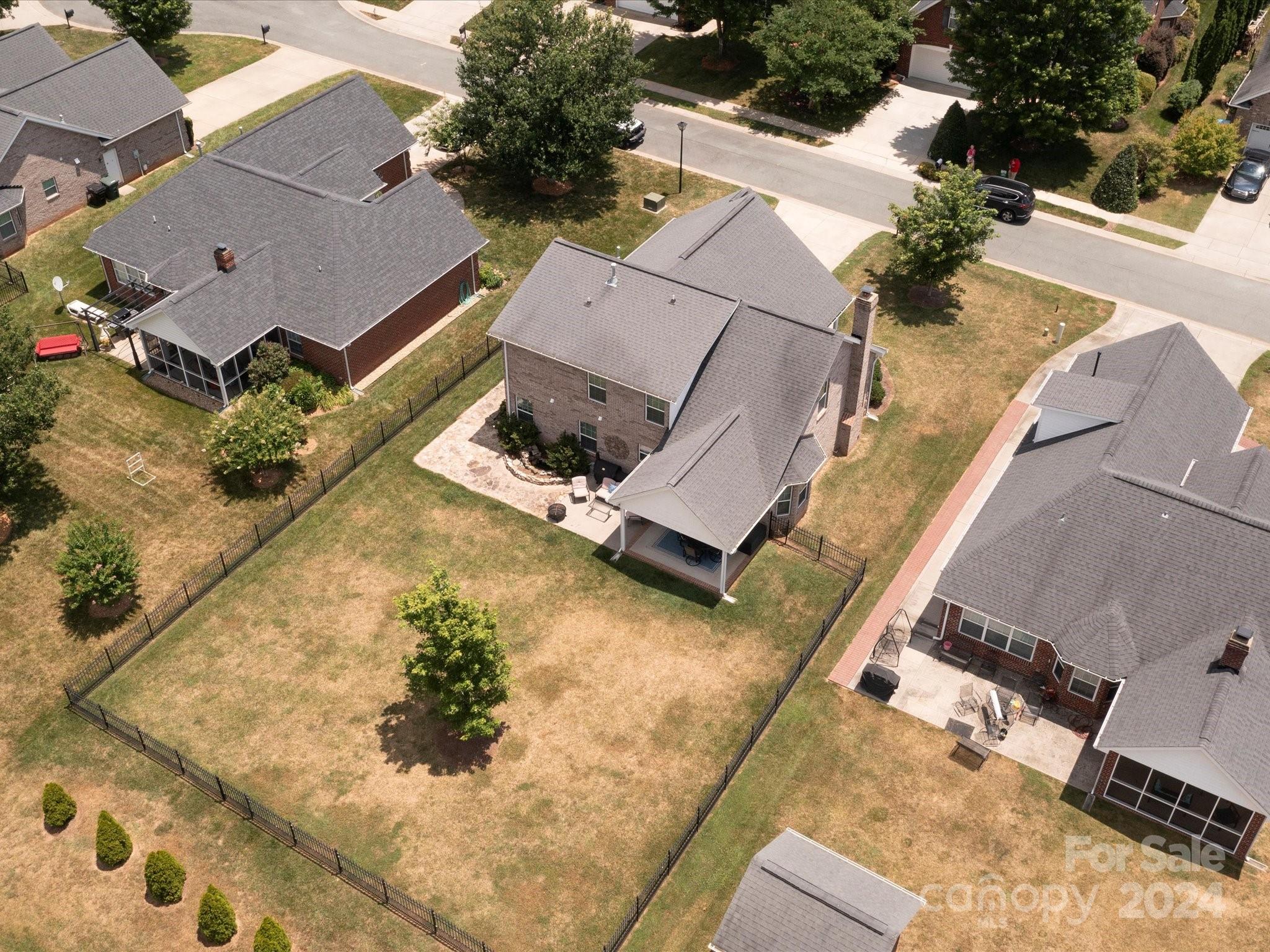 4403 Zee Court Monroe, NC 28110 - Photo 31 of 35 an aerial view of a house with a yard
