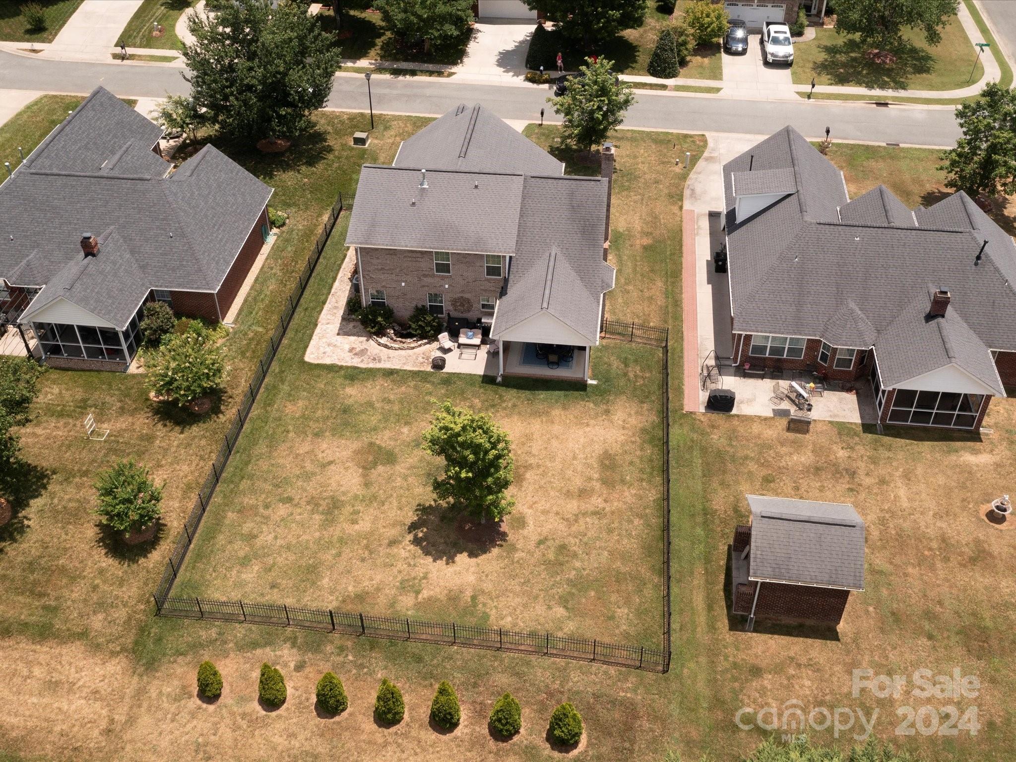4403 Zee Court Monroe, NC 28110 - Photo 32 of 35 an aerial view of a house with a yard