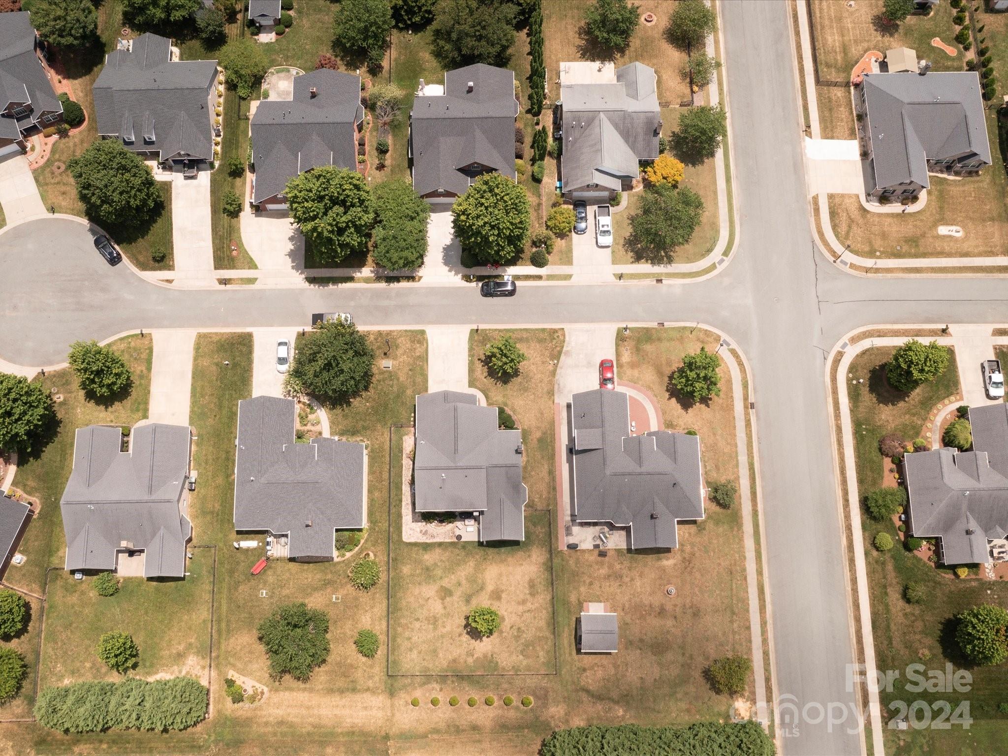 4403 Zee Court Monroe, NC 28110 - Photo 34 of 35 an aerial view of residential houses with outdoor space