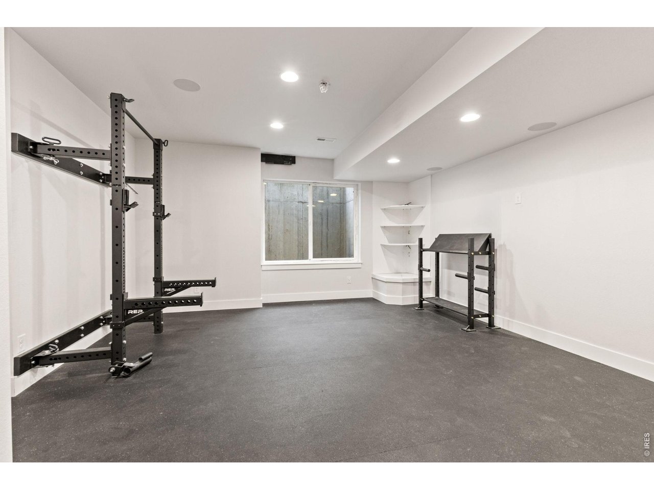 4194 Longview Lane Boulder, CO 80301 - Photo 20 of 32 Lower level flex space currently designed to be a workout/flex space with rubber flooring