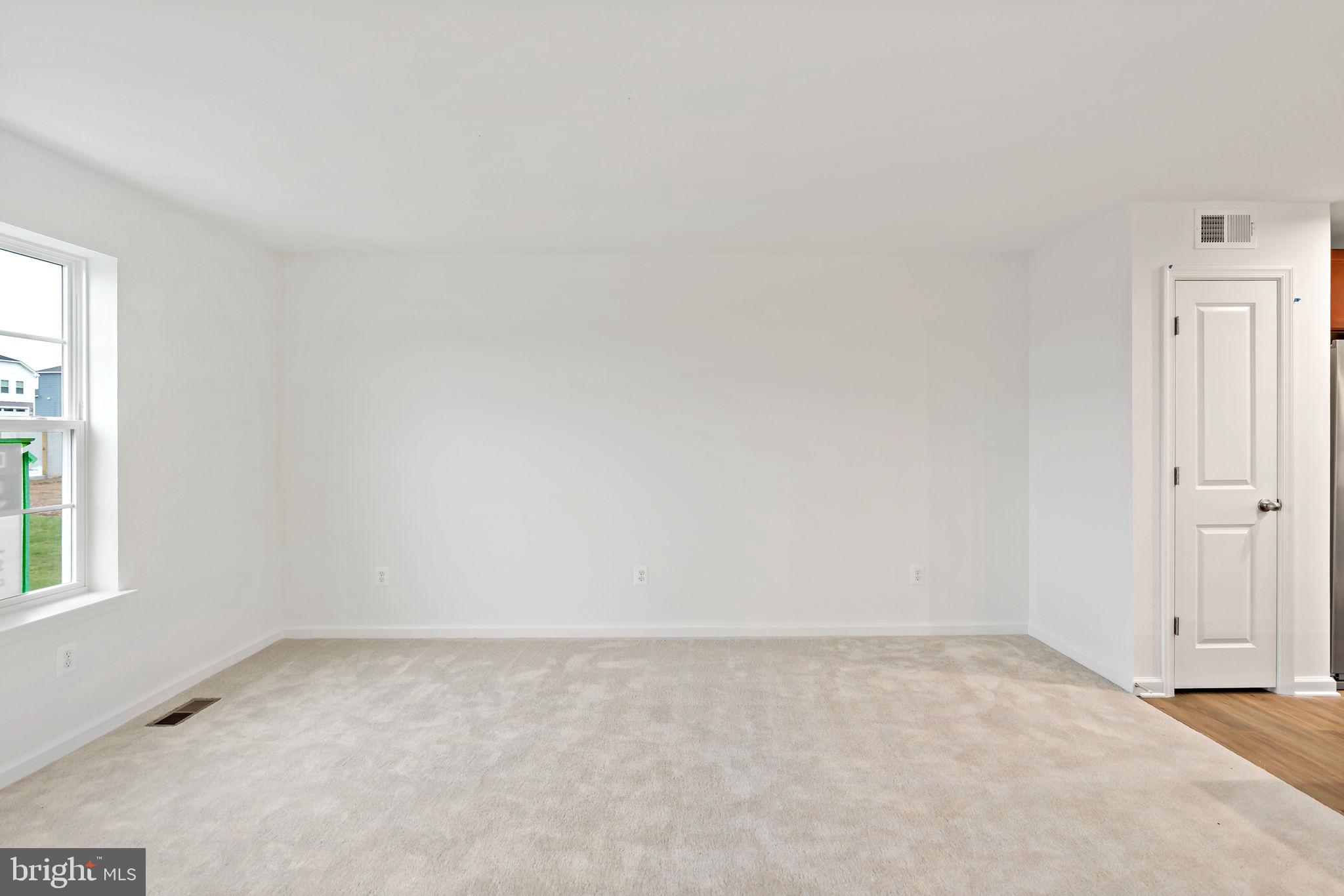 171 Grayling Road Inwood, WV 25428 - Photo 12 of 39 an empty room with a window