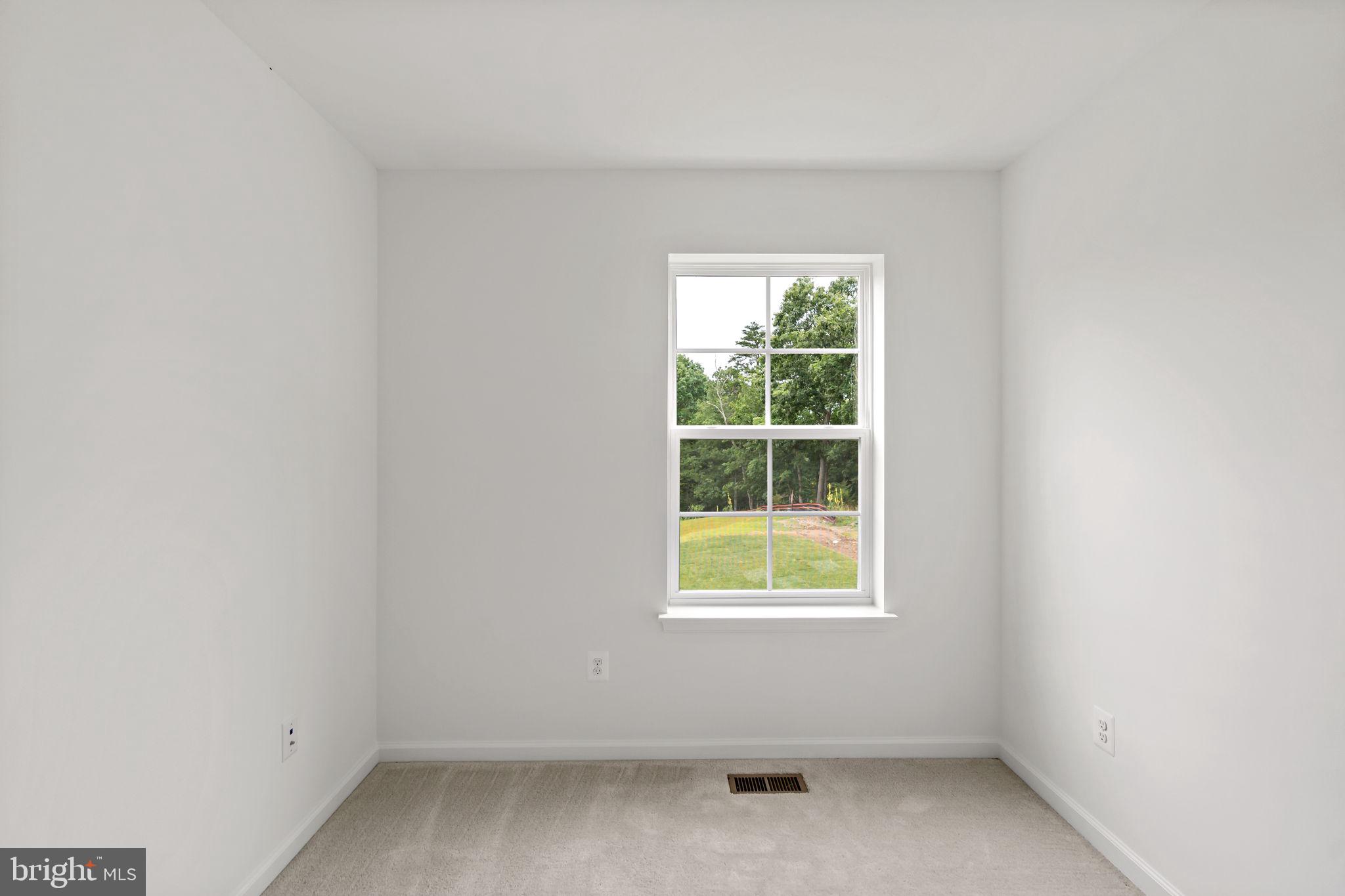 171 Grayling Road Inwood, WV 25428 - Photo 13 of 39 an empty room with a window