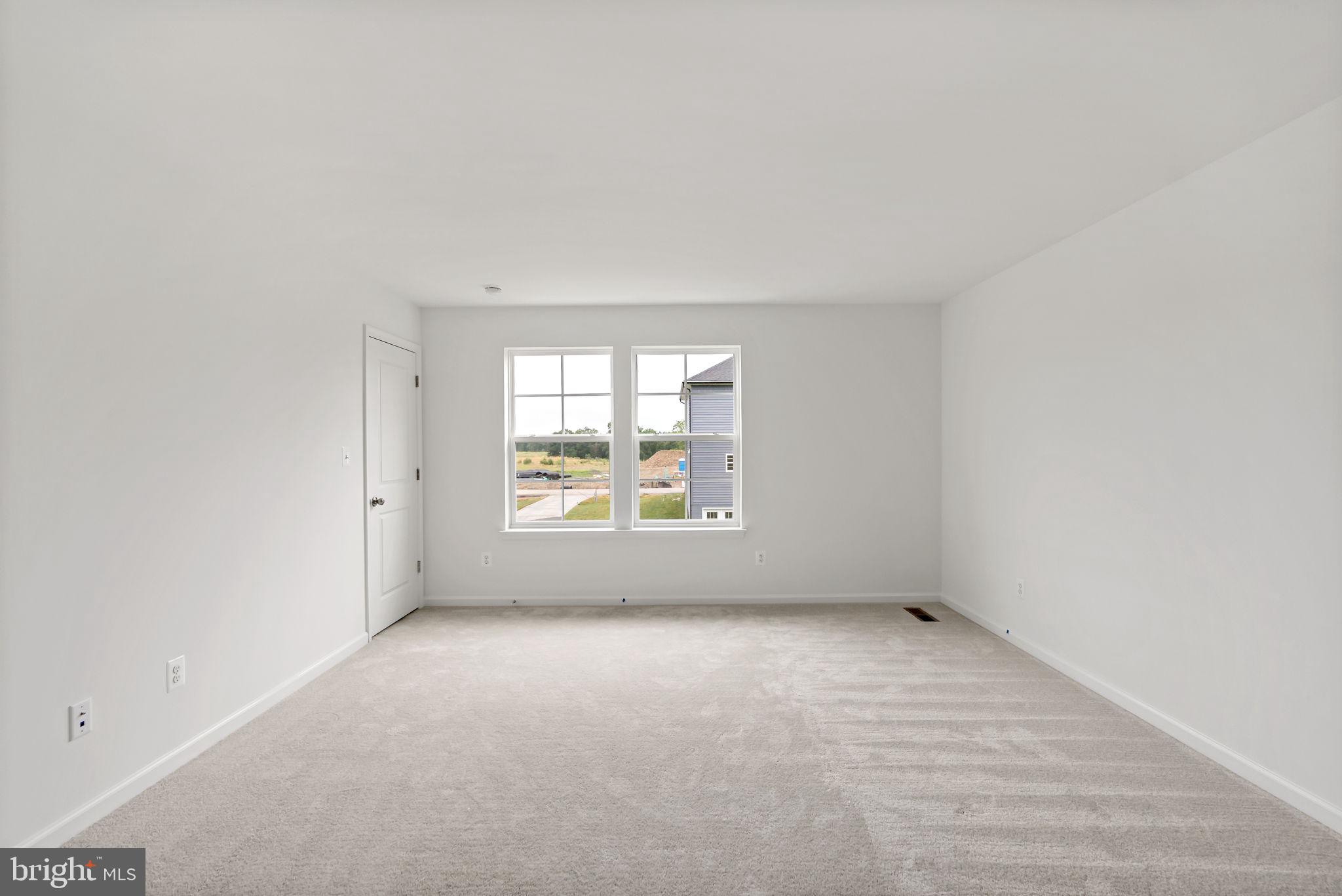 171 Grayling Road Inwood, WV 25428 - Photo 20 of 39 an empty room with windows