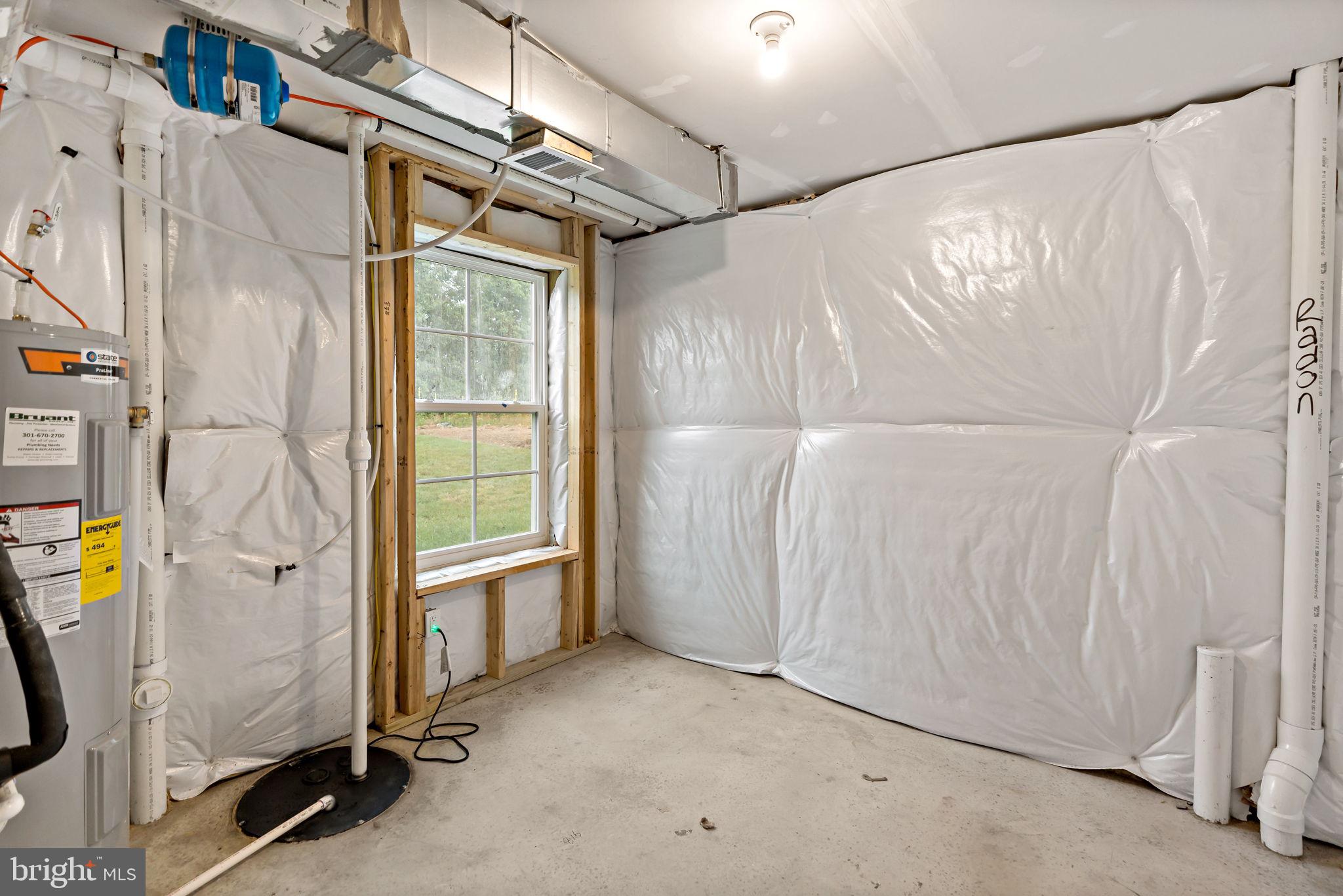 171 Grayling Road Inwood, WV 25428 - Photo 33 of 39 a view of walk in closet with window