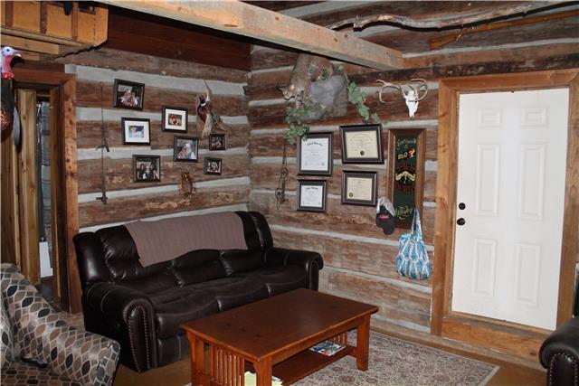 1443 Lois Ridge Road Lynchburg, TN 37352 - Photo 8 of 20 a living room with furniture and a window