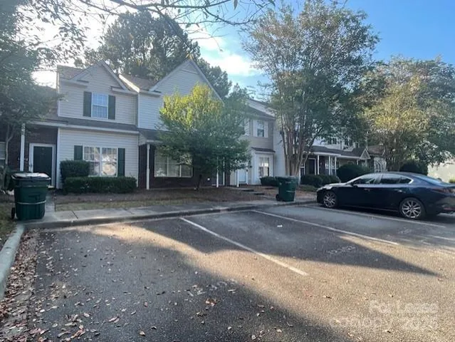 a view of street with parked cars