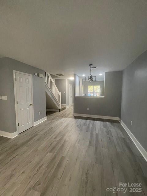 12315 Bluestem Lane Charlotte, NC 28277 - Photo 8 of 20 an empty room with wooden floor and window