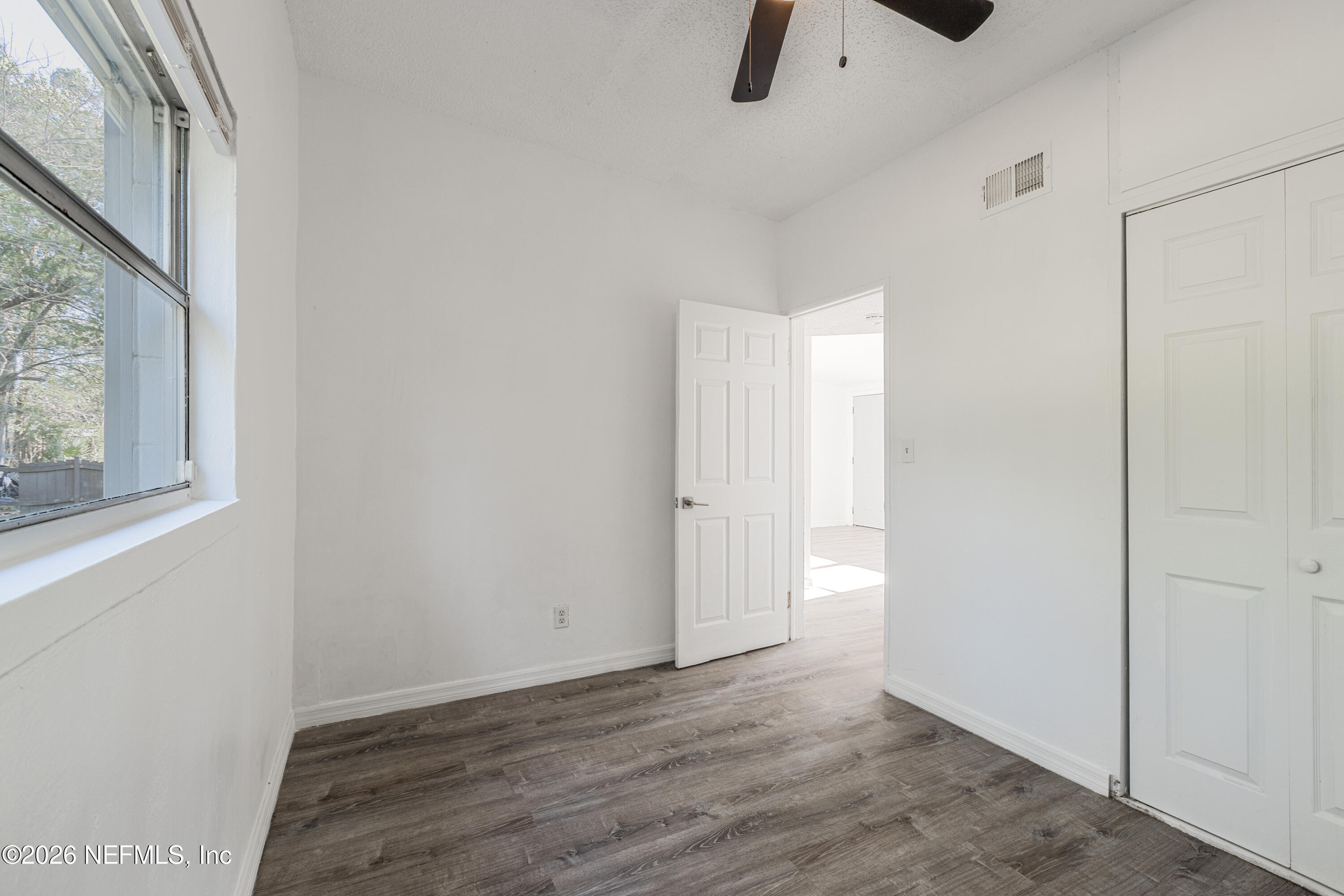 1841 Griflet Road Jacksonville, FL 32211 - Photo 17 of 23 a view of an empty room with a window