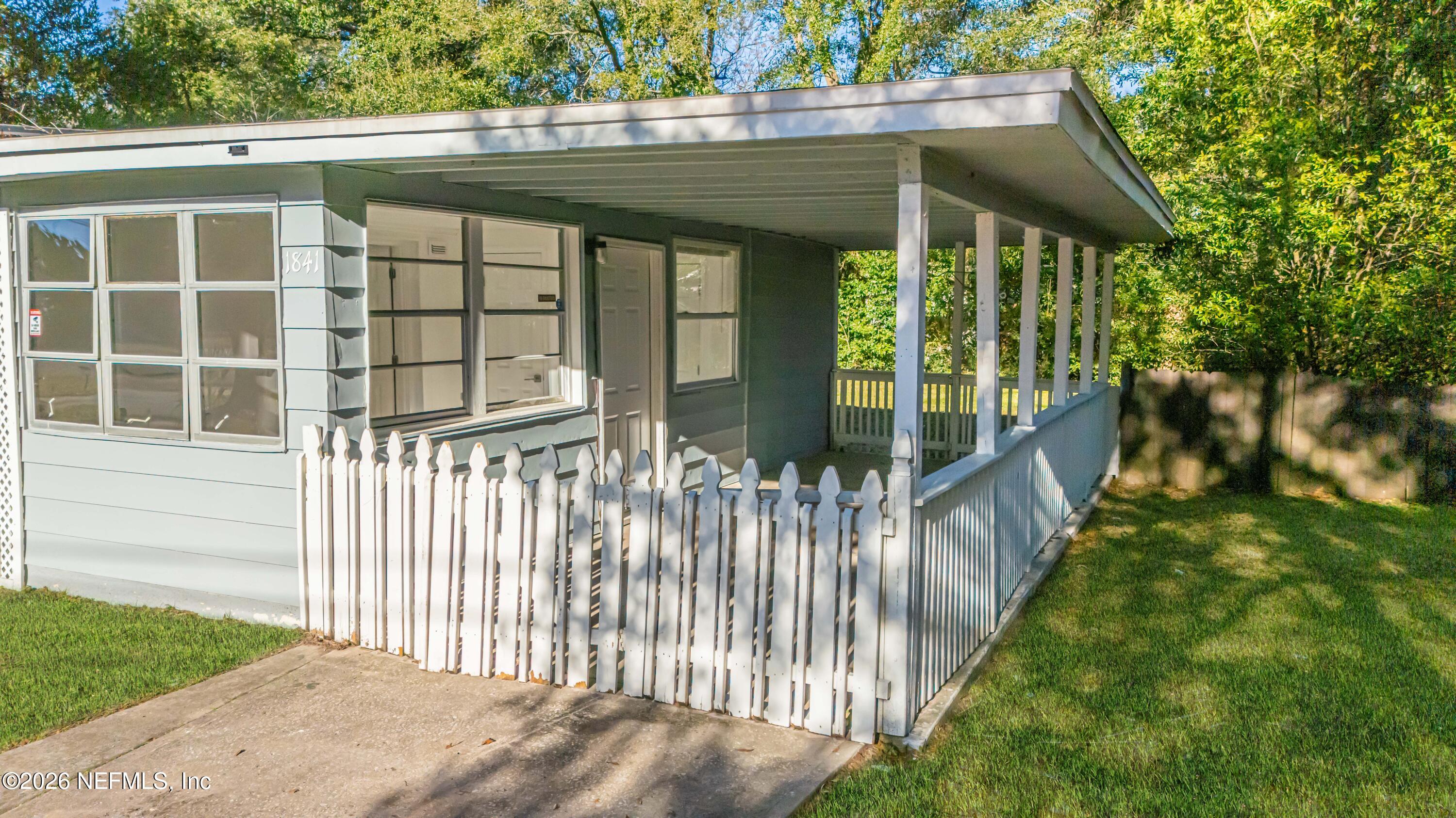 1841 Griflet Road Jacksonville, FL 32211 - Photo 2 of 20 a front view of a house with a yard