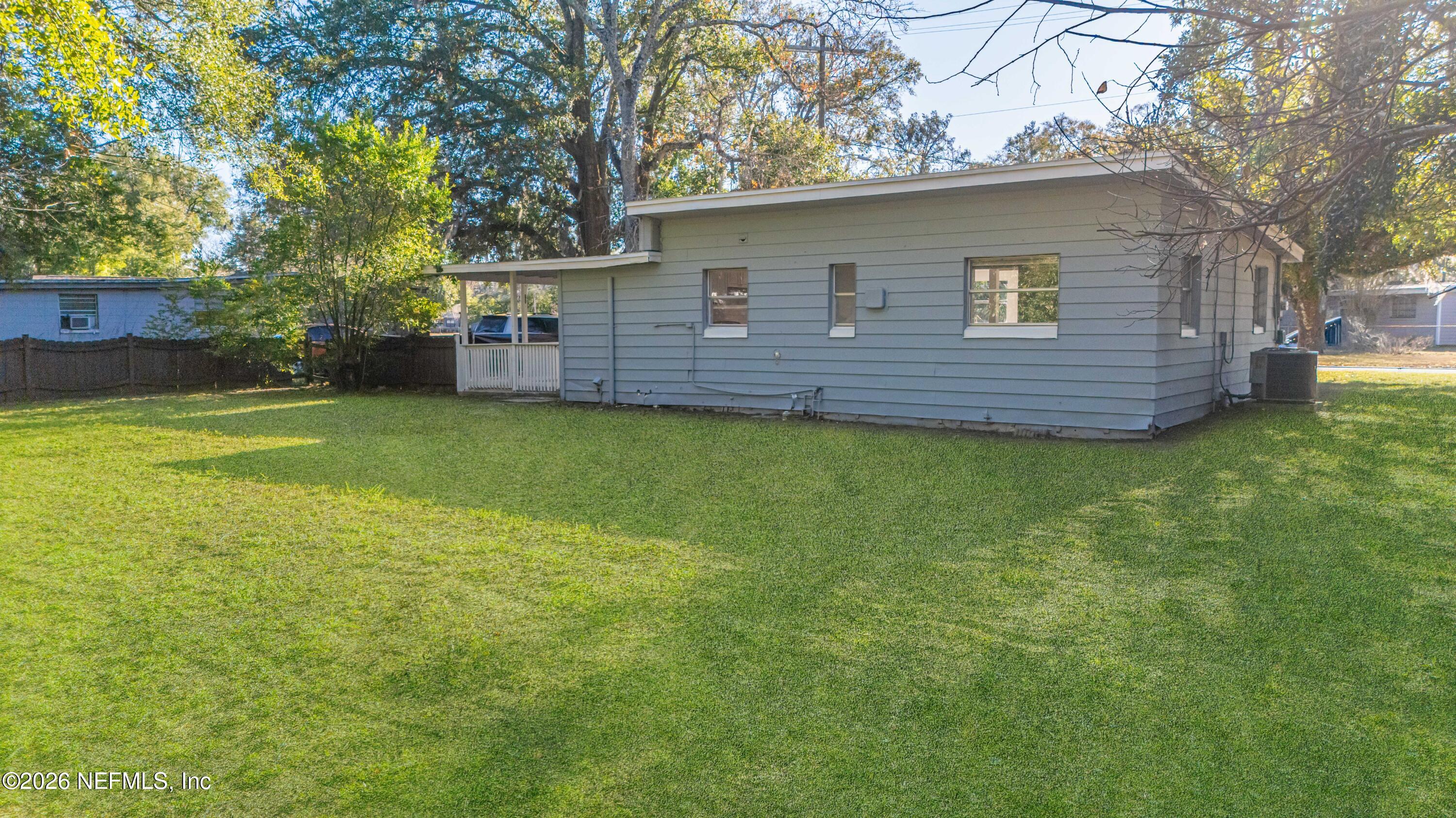 1841 Griflet Road Jacksonville, FL 32211 - Photo 21 of 23 a view of a house with a backyard