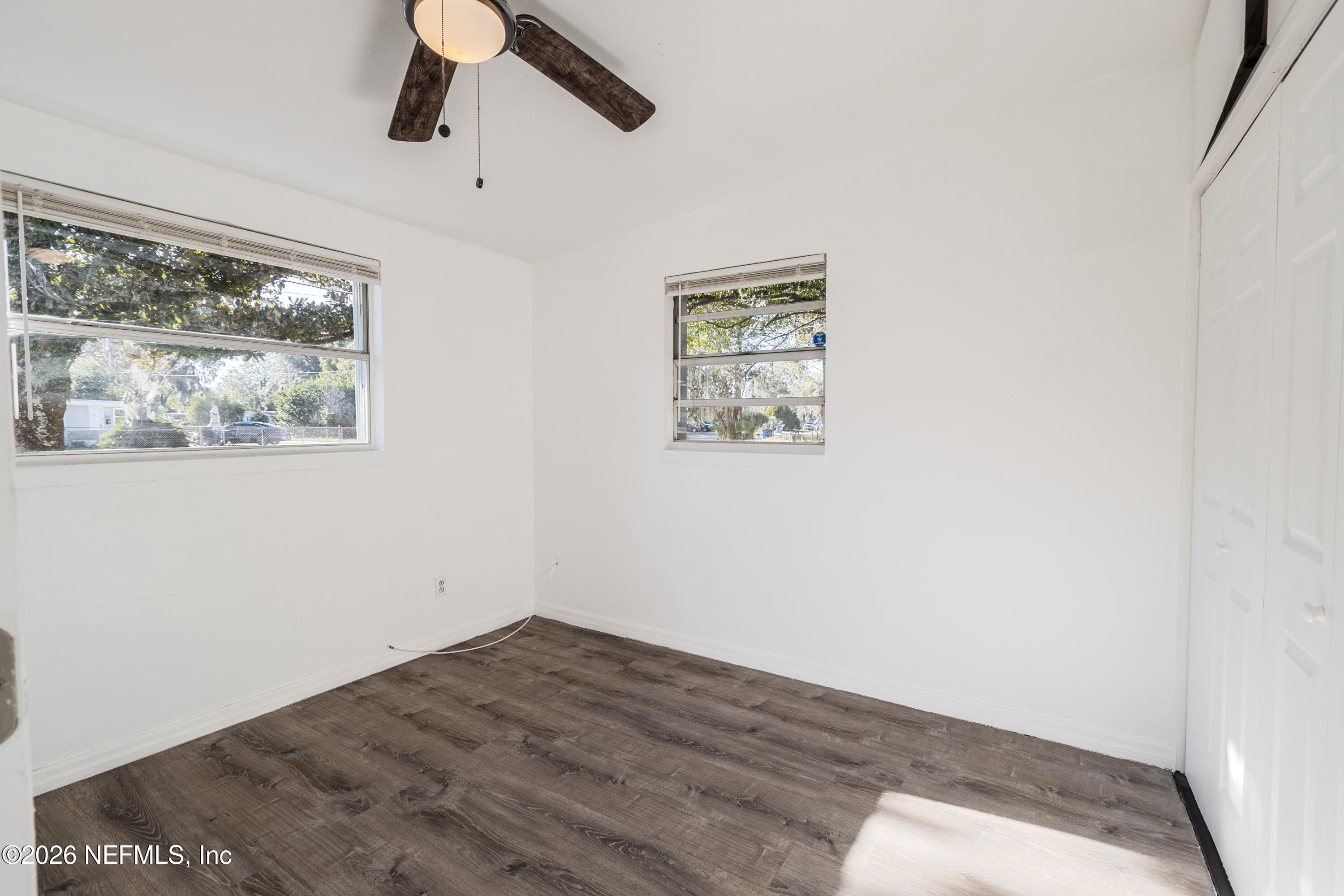 1841 Griflet Road Jacksonville, FL 32211 - Photo 7 of 23 a view of empty room with wooden floor