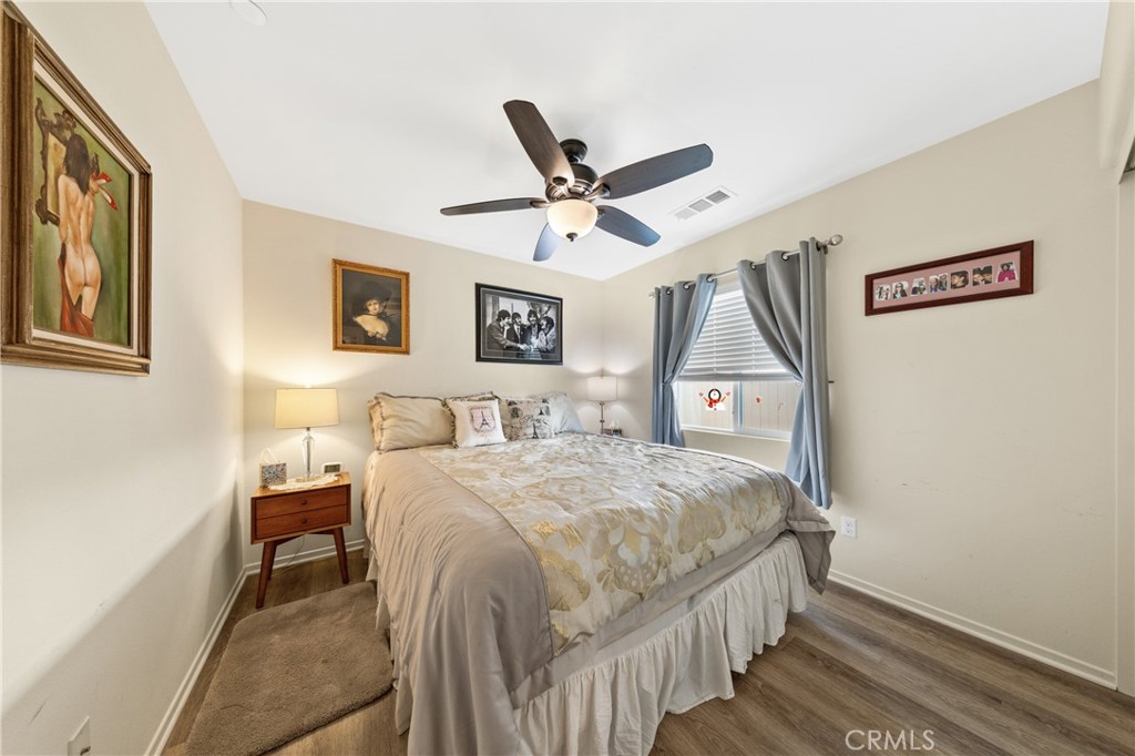 826 Avenida Del Rio San Jacinto, CA 92582 - Photo 17 of 36 a bedroom with bed and a window