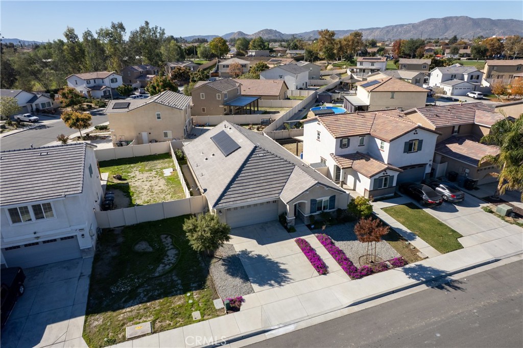 826 Avenida Del Rio San Jacinto, CA 92582 - Photo 30 of 36 an aerial view of residential houses with outdoor space