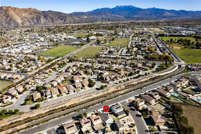 an aerial view of residential houses and city view