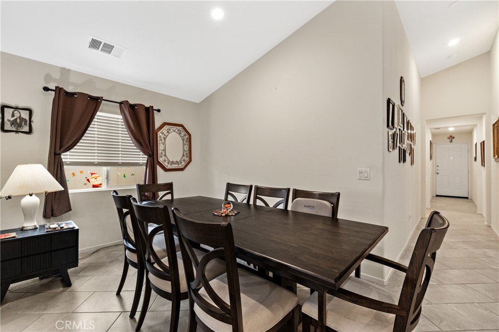 826 Avenida Del Rio San Jacinto, CA 92582 - Photo 9 of 36 a view of a dining room with furniture and window